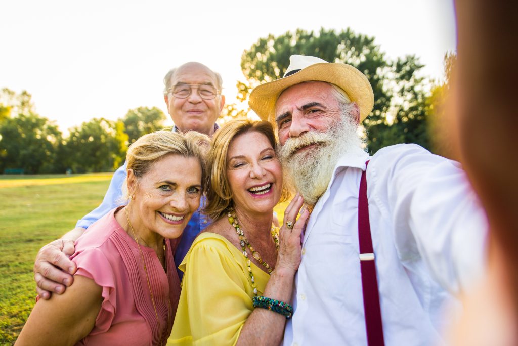 Group,Of,Youthful,Seniors,Having,Fun,Outdoors,-,Four,Pensioners